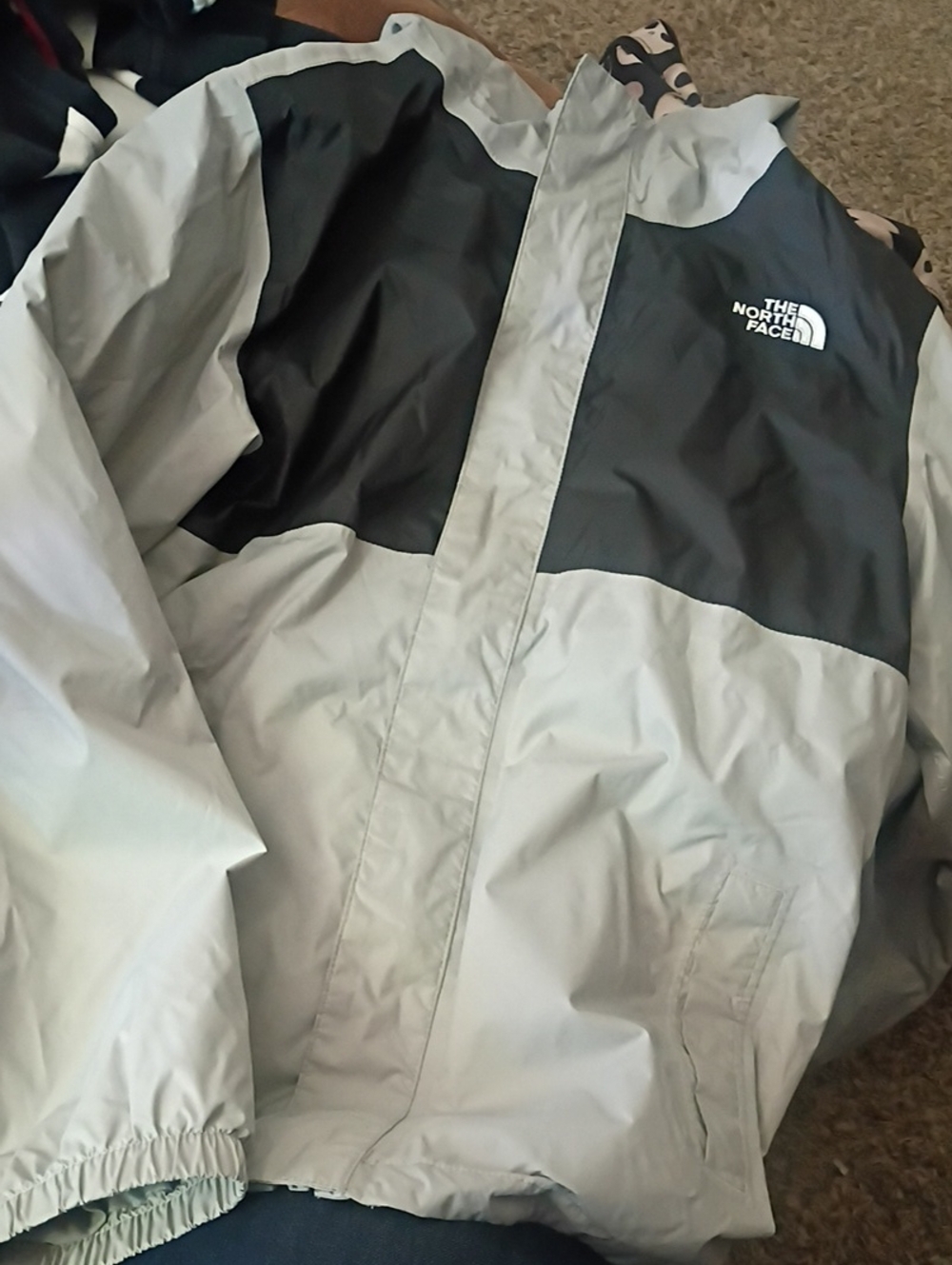 The North Face Kids Light Gray and Black Raincoat